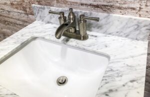 Grey and white marbled sink countertop