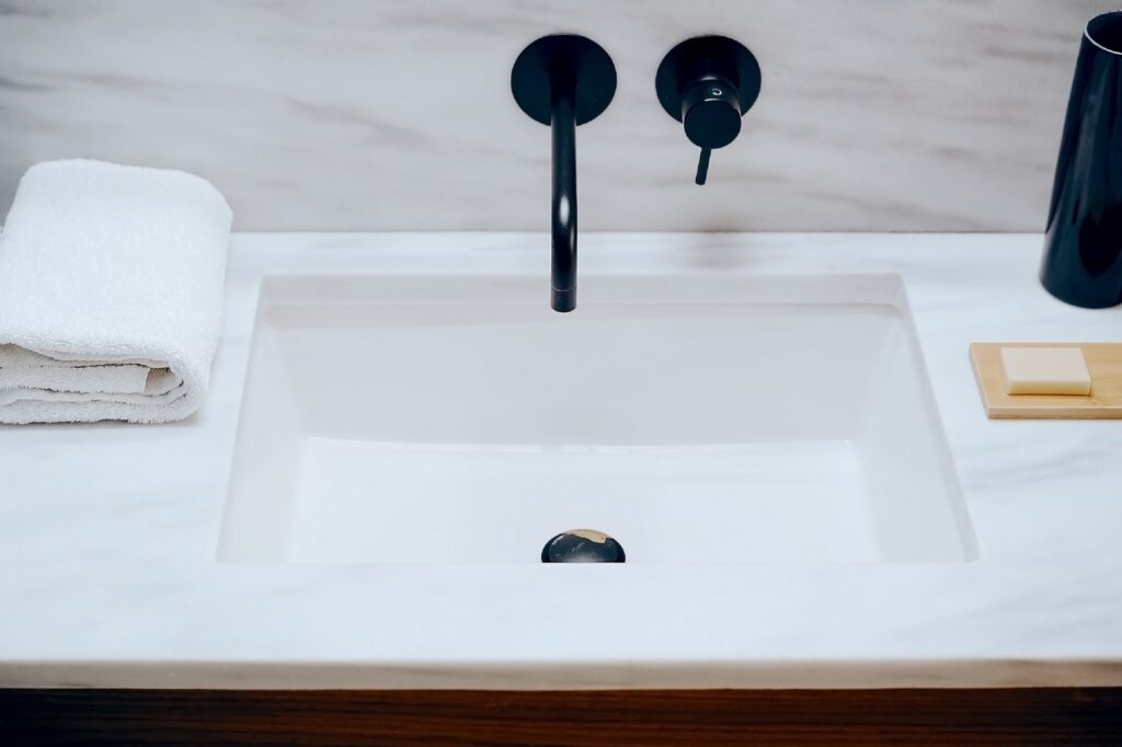 Marble countertop sink in bathroom